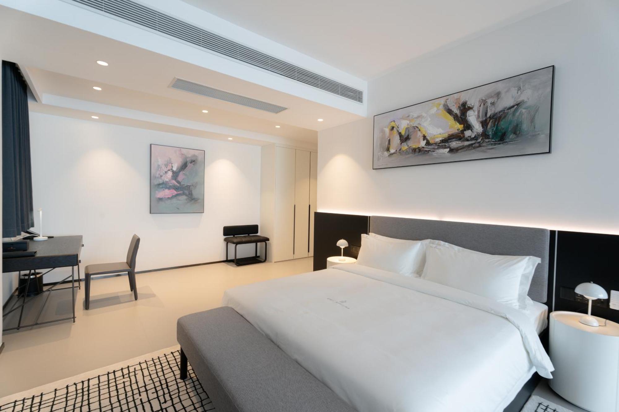 One Riviera Hotel And Residences Ban Souanmone Exterior photo
