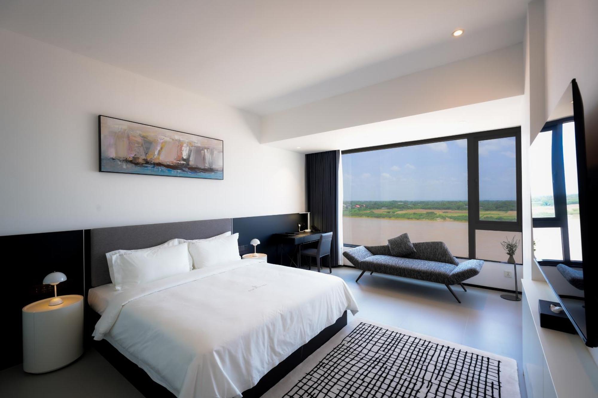 One Riviera Hotel And Residences Ban Souanmone Exterior photo