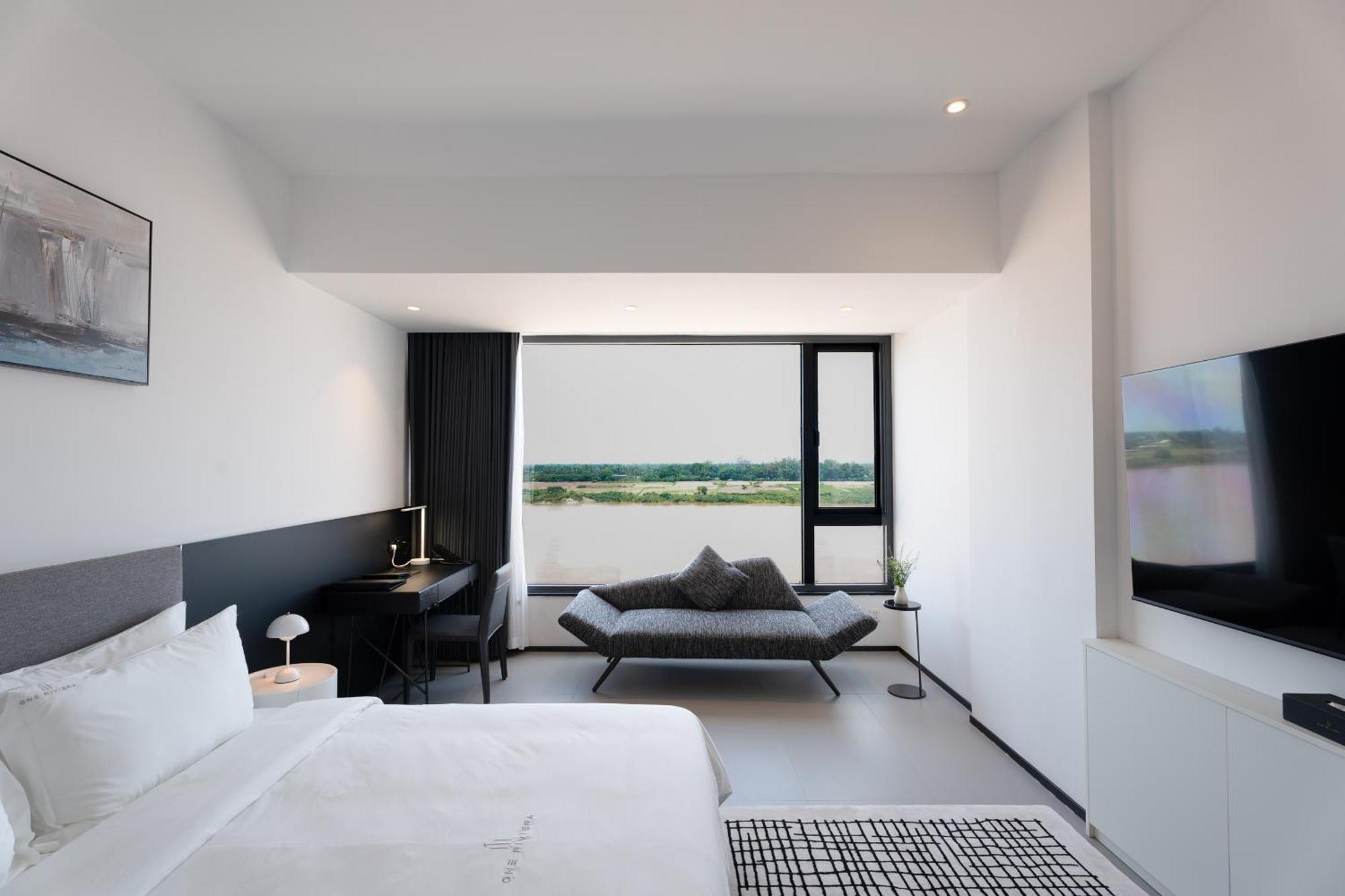 One Riviera Hotel And Residences Ban Souanmone Exterior photo