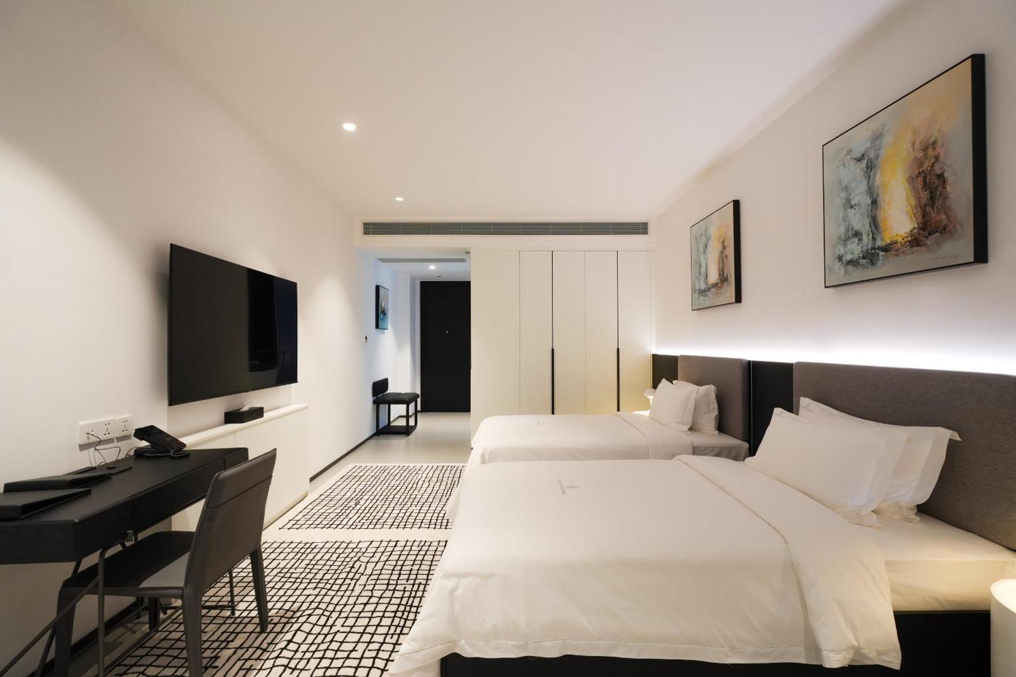 One Riviera Hotel And Residences Ban Souanmone Exterior photo