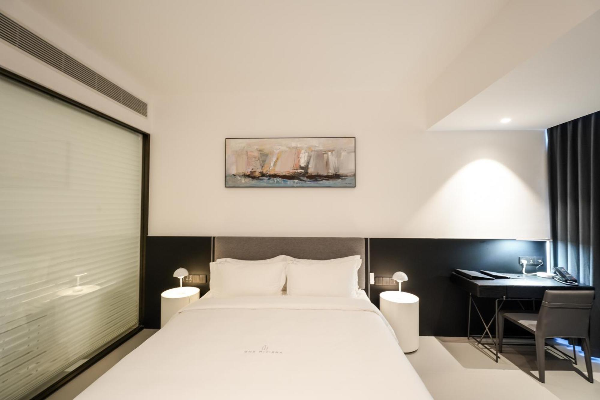 One Riviera Hotel And Residences Ban Souanmone Exterior photo
