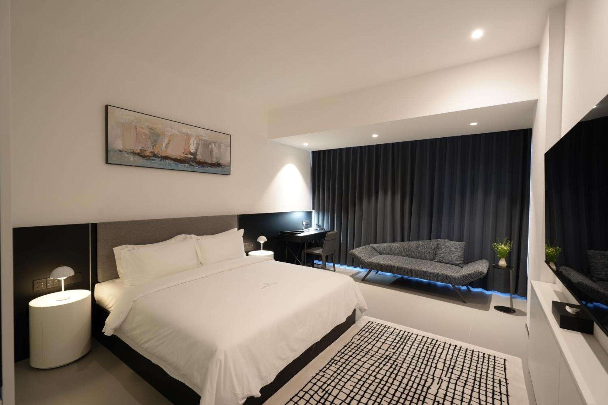 One Riviera Hotel And Residences Ban Souanmone Exterior photo