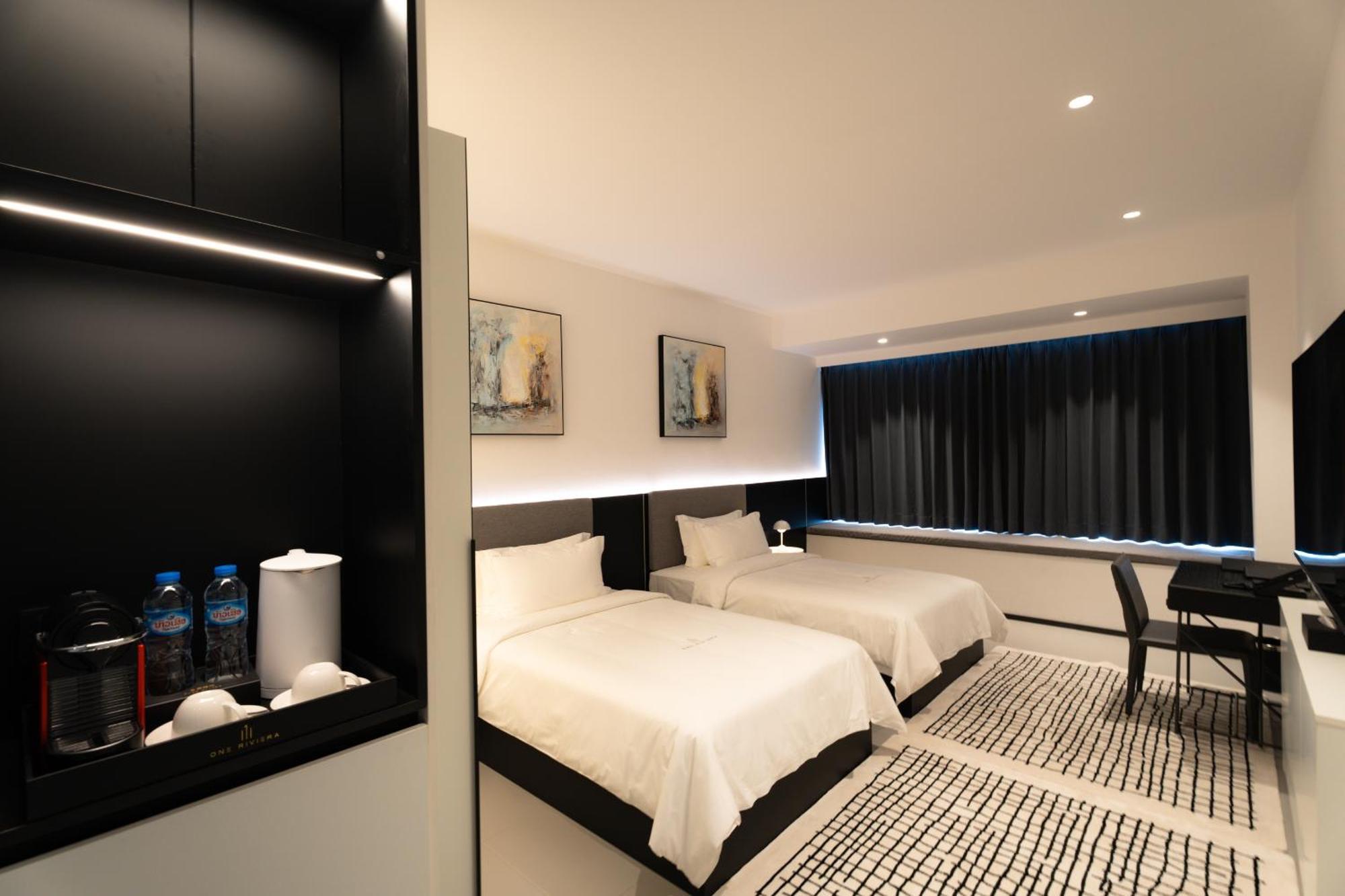 One Riviera Hotel And Residences Ban Souanmone Exterior photo