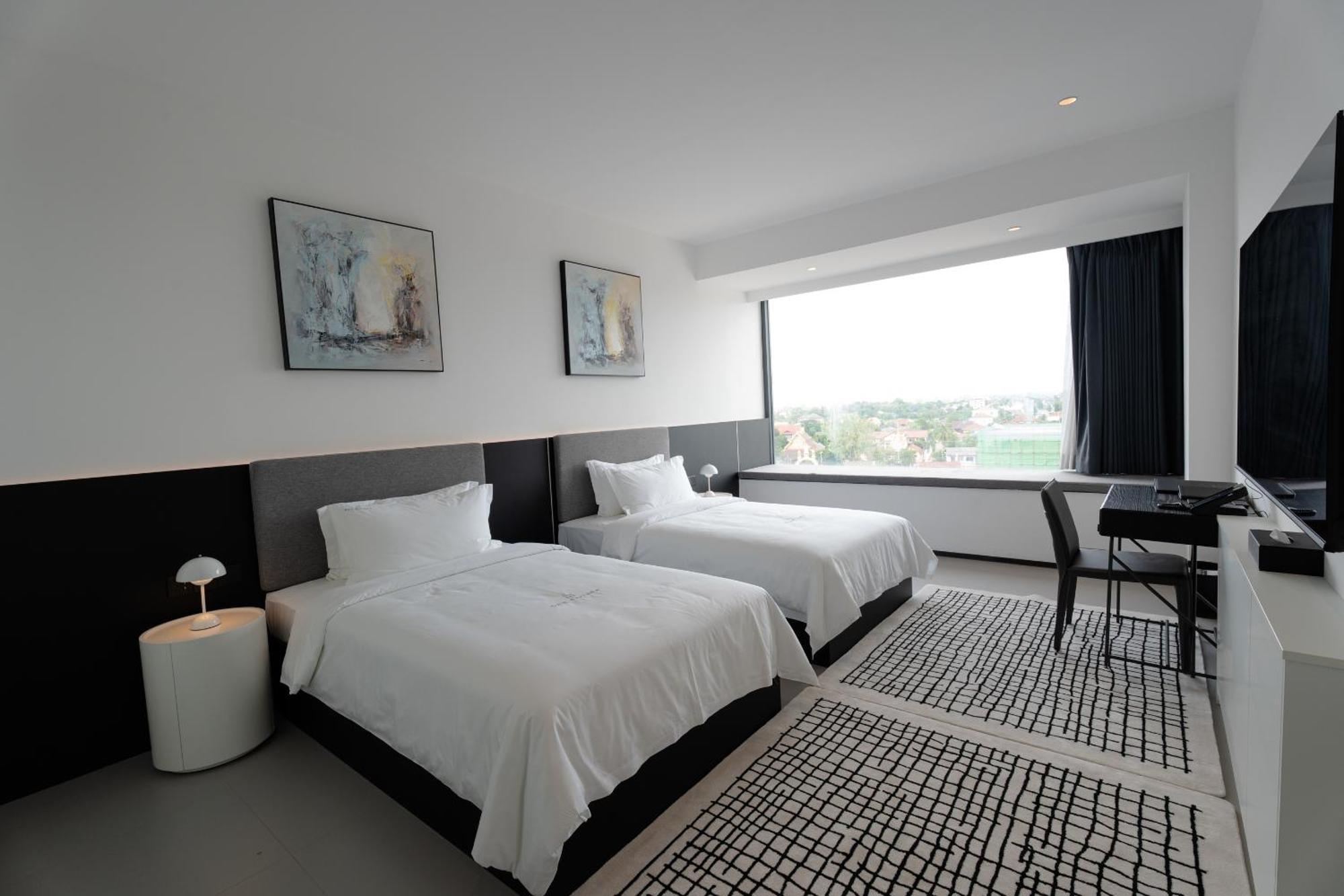 One Riviera Hotel And Residences Ban Souanmone Exterior photo