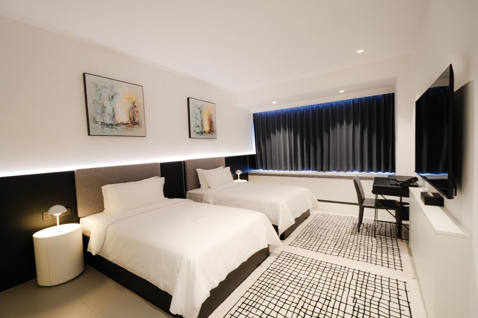 One Riviera Hotel And Residences Ban Souanmone Exterior photo