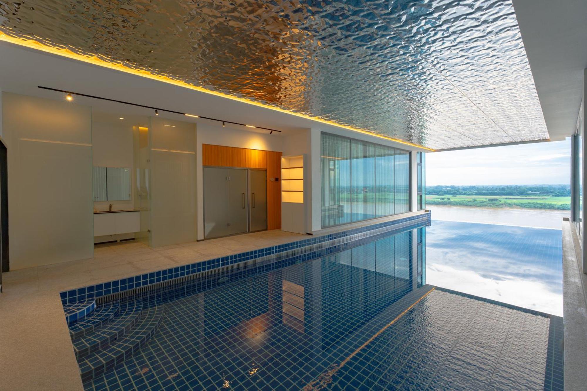 One Riviera Hotel And Residences Ban Souanmone Exterior photo