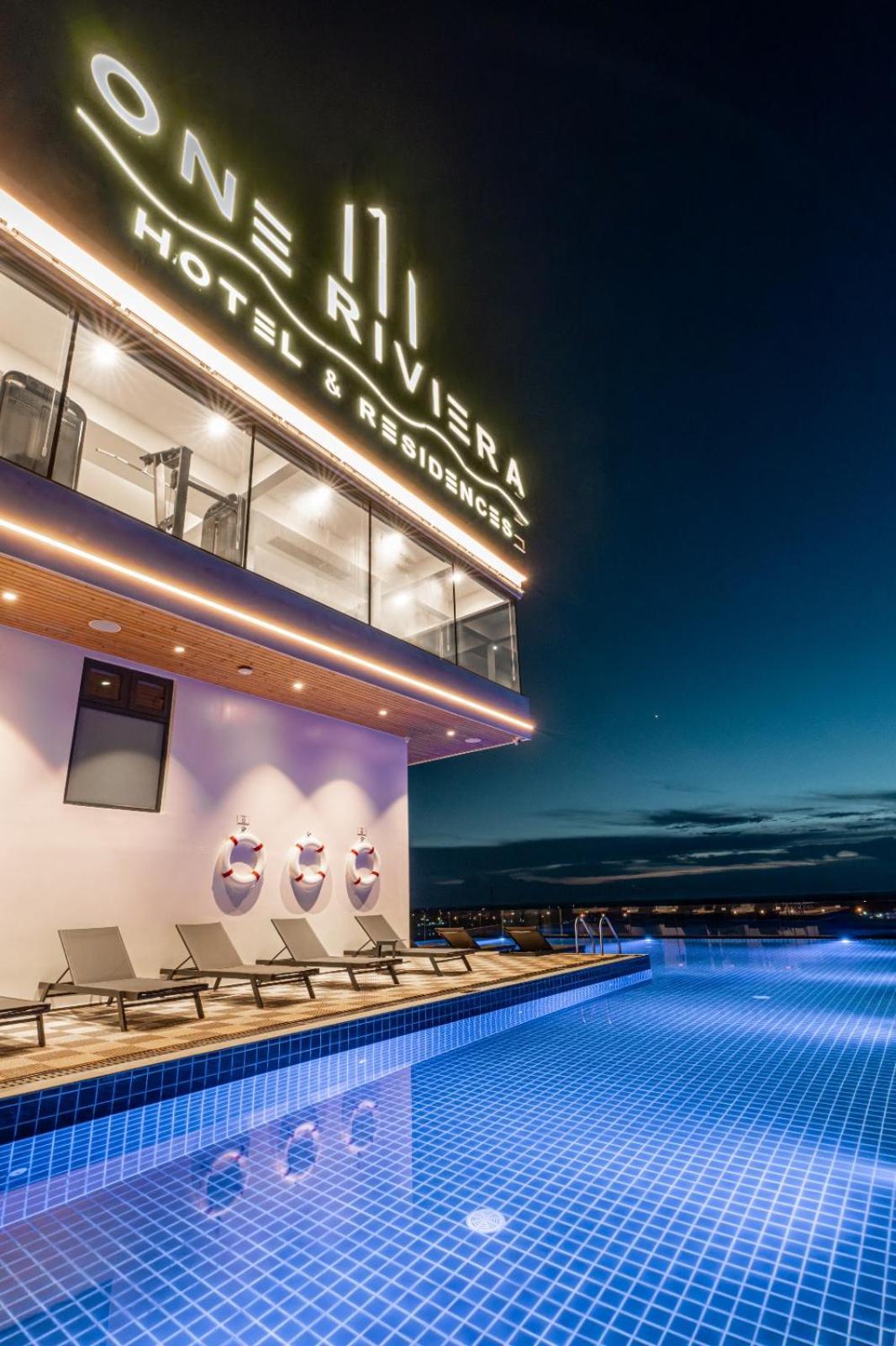 One Riviera Hotel And Residences Ban Souanmone Exterior photo